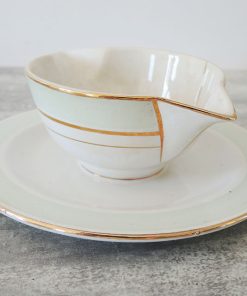 Ancienne Saucière en Porcelaine Opaque SA